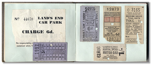 Photograph of car park tickets in open album