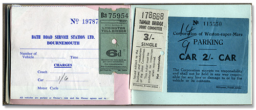 Photograph of car park tickets in open album